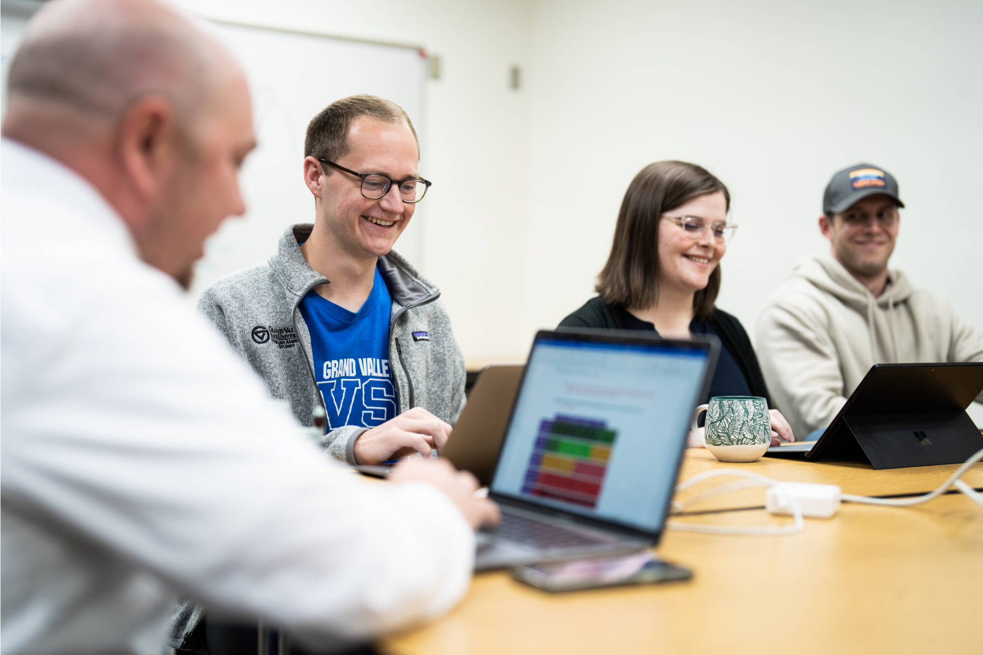 Students looking at computers